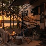 RV parked at a campsite with streaming TV playing inside.